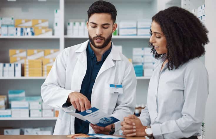 Pharmacovigilance training graduates in a pharmacy