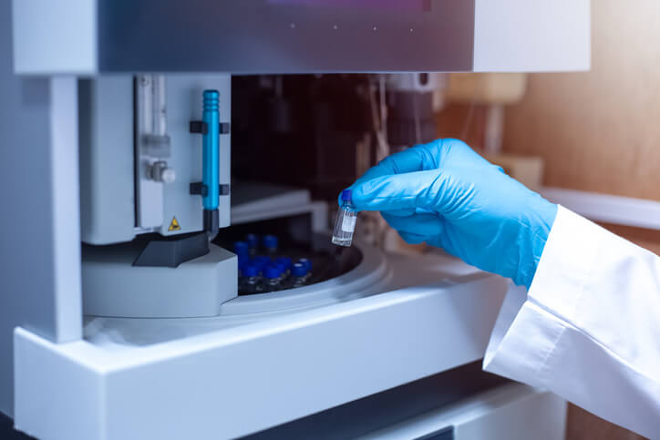 Analytical chemist in a lab after earning an HPLC certificate