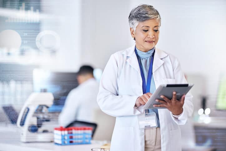 A female pharmaceutical industry leader attending an online GMP masterclass