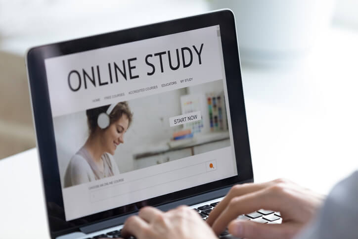 A regulatory affairs diploma student studying online with their laptop.